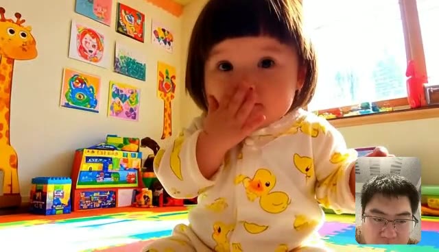 Demo 04: a toddler in duck pajamas in a playroom